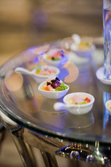 Glass shots pastry, wedding catering food, mini canapes food, tasty dessert, Beautiful decorate catering banquet table,  snacks and appetizers, wedding celebration