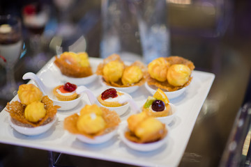 Glass shots pastry, wedding catering food, mini canapes food, tasty dessert, Beautiful decorate catering banquet table,  snacks and appetizers, wedding celebration