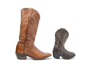 Brown cowboy boots isolated on a white background.