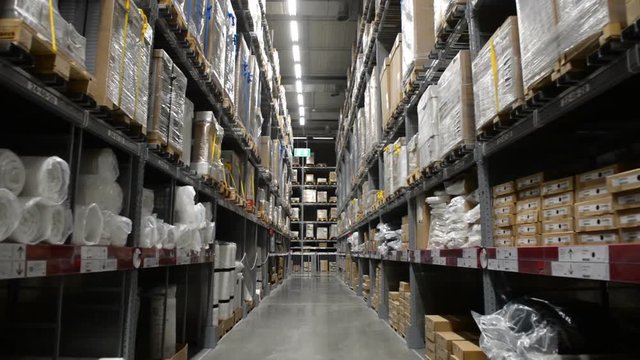 Moving between boxes on stock shelf in warehouse