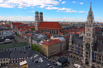 Fototapeta na wymiar Munich, Germany-APRIL 30, 2018: Famous Marienplatz and New City Hall, Cathedral of Our Dear Lady (Munich Frauenkirche) aerial view in spring day