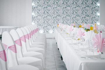 restaurant interior white. Light interior of the restaurant. White and pink. new and clean luxury restaurant in european style
