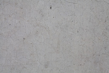 Concrete slab wall with hairline cracks