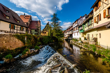 Fototapeta na wymiar Weiss river in Kaysersberg, Alsace, on a sunny spring day