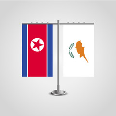 Table stand with flags of North Korea and Cyprus.Two flag. Flag pole. Symbolizing the cooperation between the two countries. Table flags
