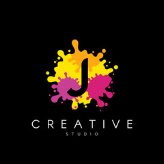 Letter J logo at colorful paint splash background.