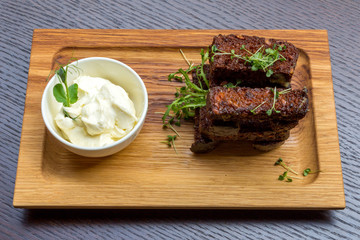 Garlic bread on wooden platter