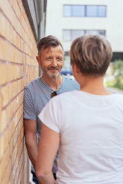 Portrait of smiling mature man looking at woman