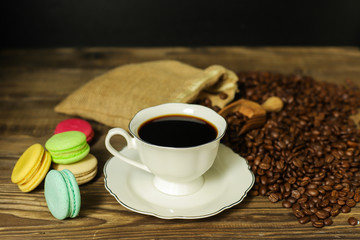 Hot coffee with coffee beans
