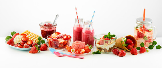 Strawberry themed panorama of fresh fruit recipes