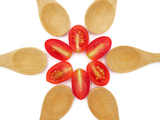 Fresh grape or cherry tomato with wooden spoon on white background.
