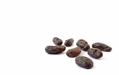 Raw peeled cacao beans on white background