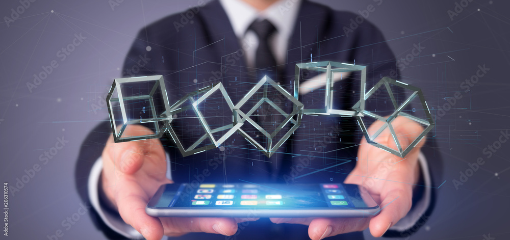 Poster businessman holding a 3d rendering blockchain cube isolated on a background
