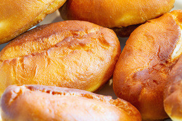 Fried homemade pies. Closeup, selective focus