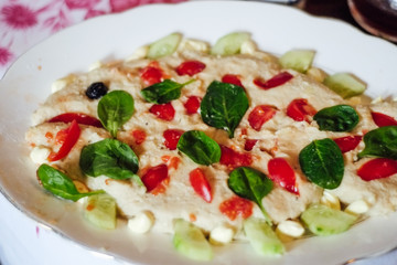 Healthy typical italian fish and cream dish ready to be eat on the plate. Florence Italy
