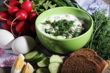 A bowl with traditinal Russian cuisine soup okroshka