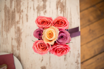 Vintage photography with beautiful roses in a hand-made box ..