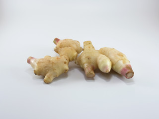 Fresh ginger on white background.