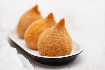 Brazilian snack coxinha de frango on dish