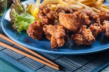 Crispy chicken karaage served with french fries