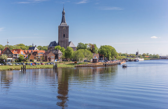 River and tower of the Stephanus church in Hasselt