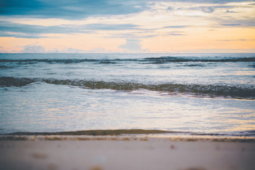 Small waves in the sea in the morning light