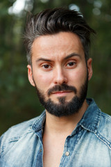 Fototapeta premium Young handsome bearded hipster man