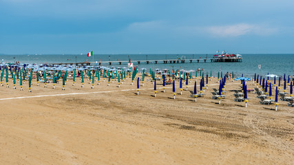 The beach and the pier of Lignano Pineta