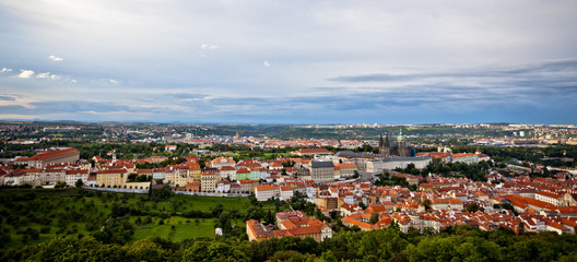 Beautiful panoramic aerial view of Prague Castle and the old town from the observation tower on Petrin hill in Prague, Czech Republic.