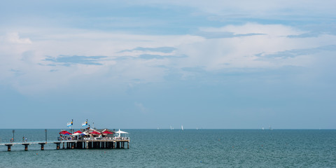 The beach and the pier of Lignano Pineta