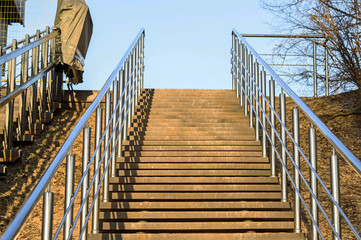 Stairs leading to the Park, bottom view. Background. Sharpness in the middle field