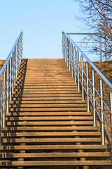 Stairs leading to the Park, bottom view. Background. Sharpness in the middle field