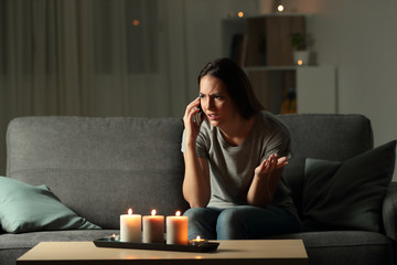 Woman calling insurance in the night after blackout