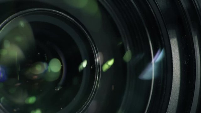Security camera lens zooming in, close up. Private property protection and public surveillance concept.