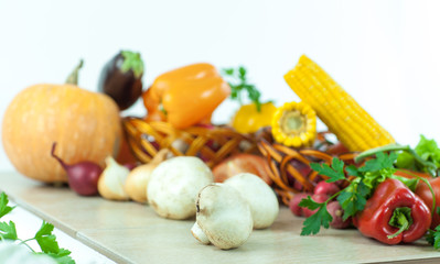 mushrooms on a background of fresh vegetables.