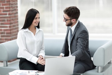 business partners discussing business documents before signing the contract.