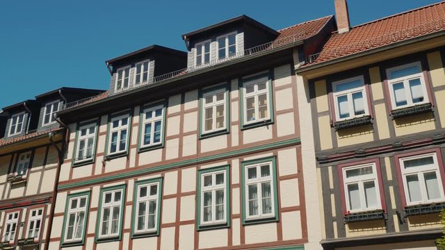 Recognizable ancient style of construction - Facades of typical German houses. Steadicam shot