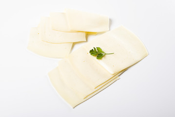Slices of cheese on white background. Isolated.