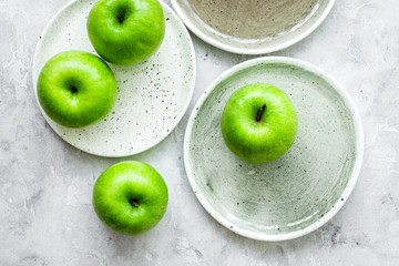 fresh organic green fruits with apples on stone background top v