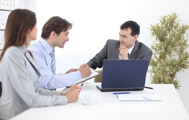 business team discusses work plan