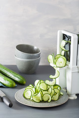 spiralizing cucumber vegetable with spiralizer