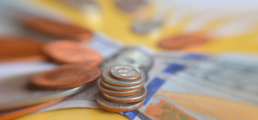 Finance background. Sharpness on coins edge.