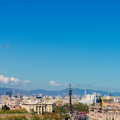 Fototapeta premium Aerial Panorama view of Barcelona city skyline over Passeig de Colom or Columbus avenue and Port Vell marina