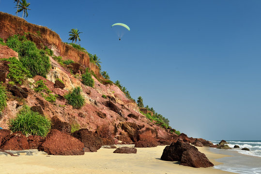 Exotic orange cliff beach in Varkala - Kerala. India