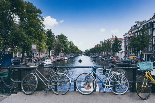 Bicycles along bridge at Amsterdam Canal