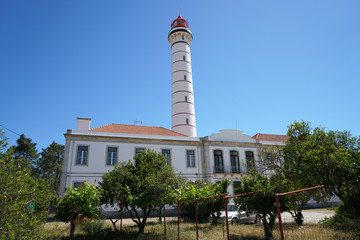 Obraz premium Lighthouse with lighthouse house on the Iberian Peninsula in spring