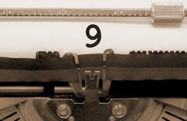 9 Number by the old typewriter sepia effect