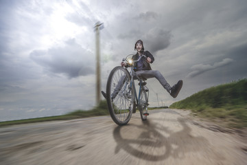 Fototapeta na wymiar bicyle ride through field