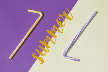 Creative view of drinking straws for party on a two-tone background - ultra violet and yellow....