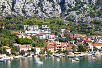 Fototapeta na wymiar Montenegro. Kotor Bay. A picturesque view of the embankment of Dobrota town on a sunny summer day